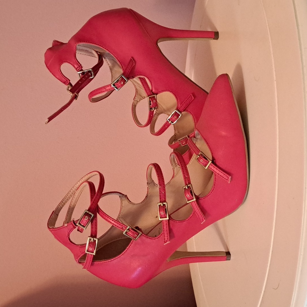 Strappy red heels